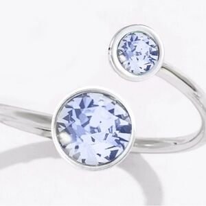 Curled Up Ring with Light Sapphire Swarovski crystals rhodium plated ONE SIZE